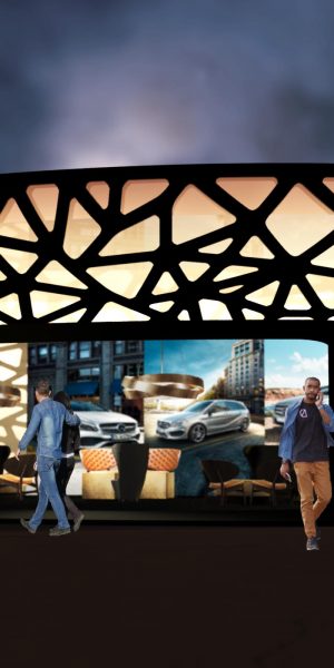 Beleuchteter, runder Messepavillon mit organischem Fassadenmuster und Mercedes-Branding bei Nacht.